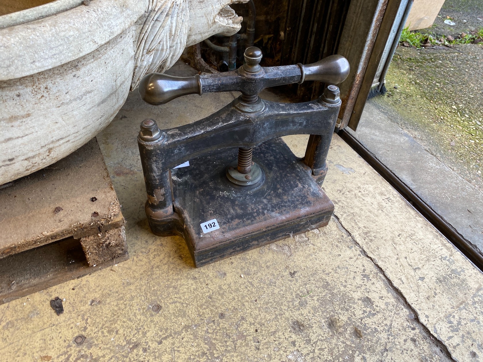 A Victorian cast iron book press, height 36cm